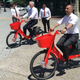 Mayor Jorge Elorza, right, riding an Uber Jump bike with Tufts Health Plan CEO Tom Croswell in in Providence, Rhode Island in July 2018.
